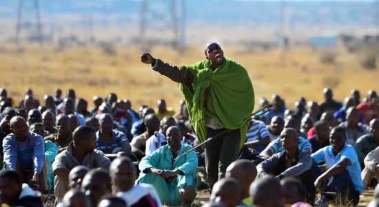 Man addressing a crowd